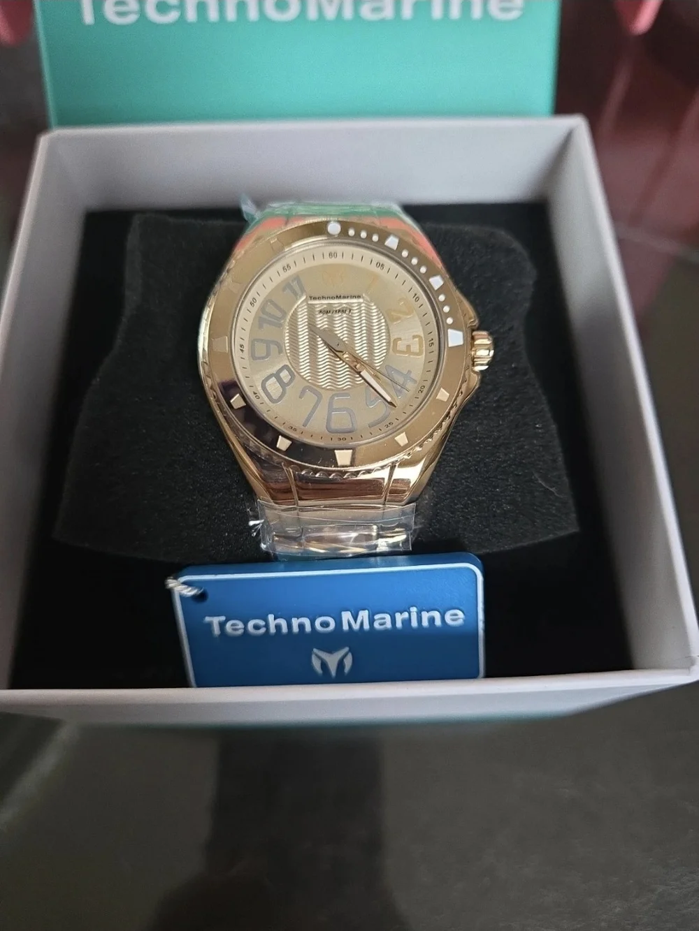 TM226010 TechnoMarine Invicta Gold Tone Unisex Watch with Wave Dial 38mm